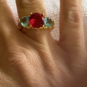 Elegant Gold Ring with Red and Blue Stones